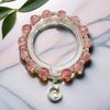 Braccialetto in Vetro Fiore Esplosione Fantasy da 10 mm: Ciondolo Farfalla Colore Degradé Design di Nicchia per Donne e Migliori Amiche.