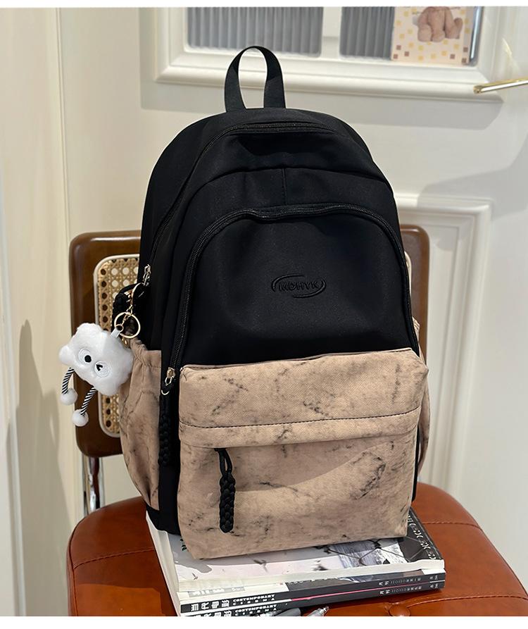 School bag 2025 new tie-dye backpack Korean version fashionable and cute large-capacity school bag casual simple backpack