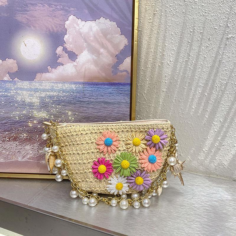 

Spring and summer seaside beach vacation straw bag niche hand-woven flower pearl shoulder messenger bag