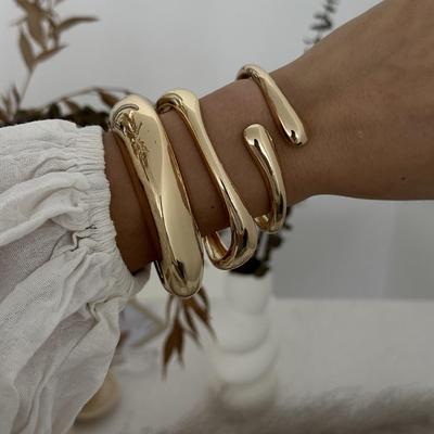 Europeisk och amerikansk metallglans vattendroppe statement armband för kvinnor