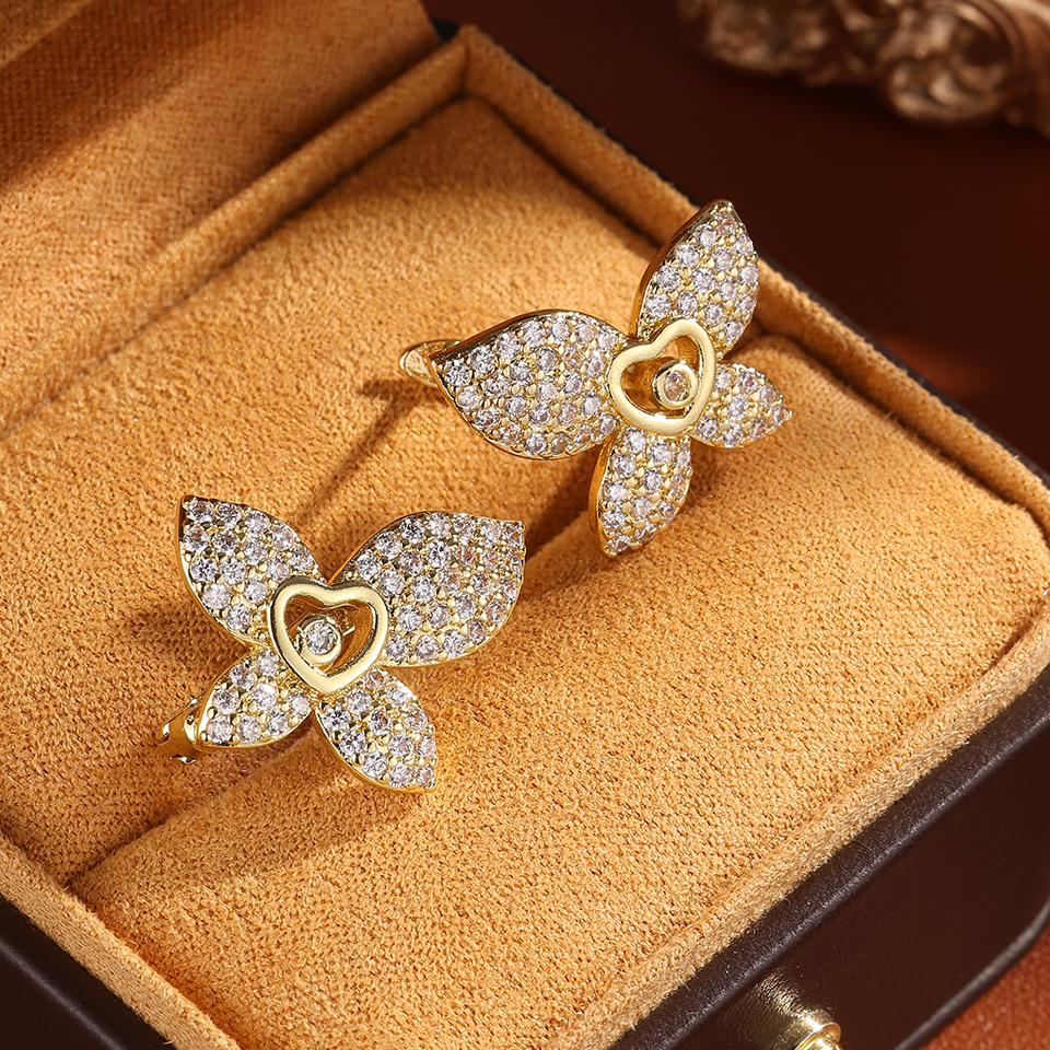 

ZAKOL Unique Design Leaf Flower CZ Stud Earring Micro Pave Sparking Cubic zirconia Elegant Wedding Earrings Party Zircon