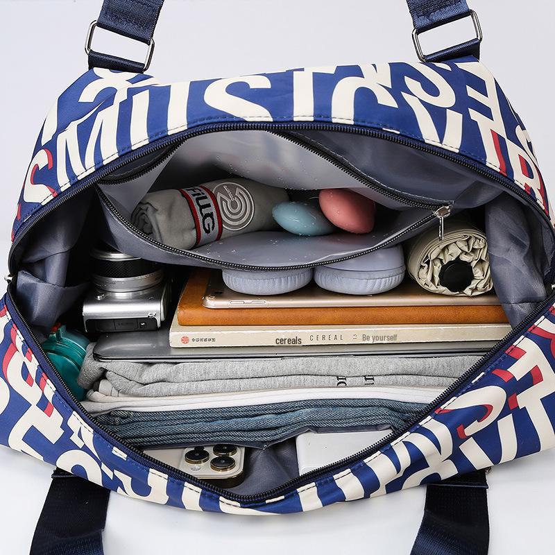 Multifunctional Yoga and Sports Travel Bag with Dry/Wet Separation, Large Capacity, and Trolley-Ready Design.
