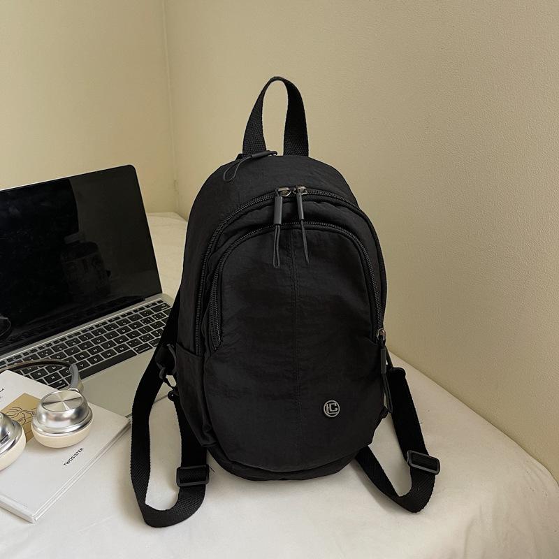 2025 лето новый зарубежный стиль текстура простой модный рюкзак повседневный личность тренд женский нишевый рюкзак чёрный