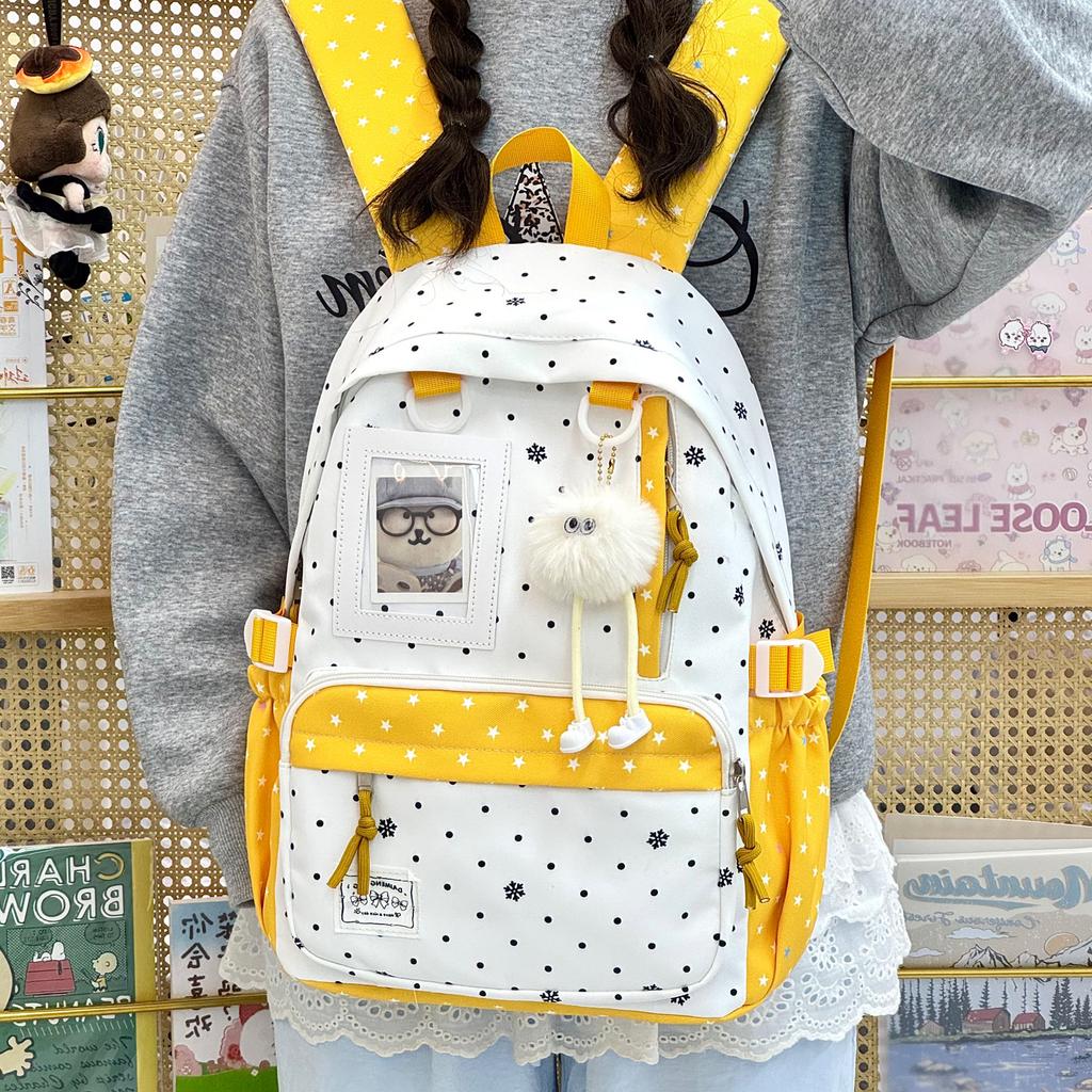 Schoolbag new high-value sweet and cute polka dot primary school backpack female volume two-dimensional transparent double shoulder pain bag