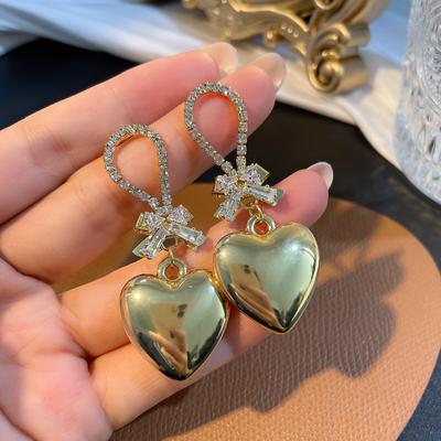 Novo amor pêssego coração diamante arco brincos ins retro menina hip-hop brincos