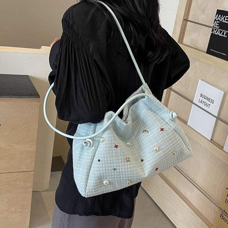 Large-capacity bag women's 2025 spring and summer new fashion woven tote bag simple and versatile commuter shoulder bag