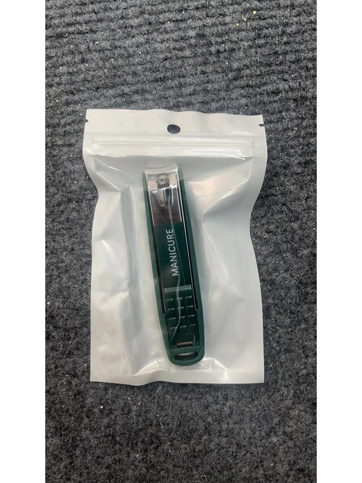 Compact Green Anti-Splash Nail Clipper Set: 4-Piece Manicure Kit with Nail File, Clippers, and Art Tools Available.