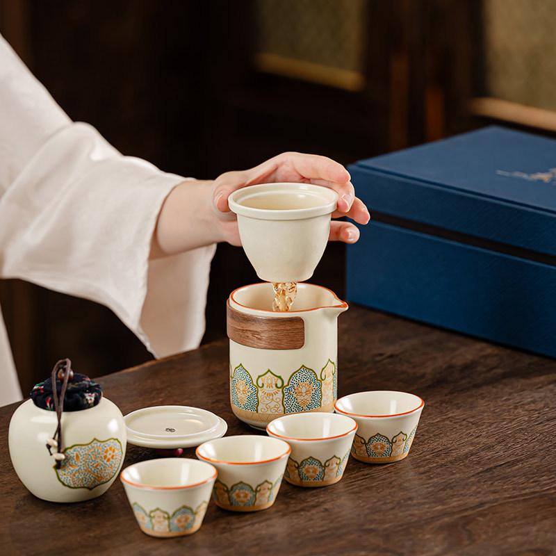 Portable travel Guyun tea set, household Ru kiln opening, one pot of four cups, high-end light luxury gift box ceramics