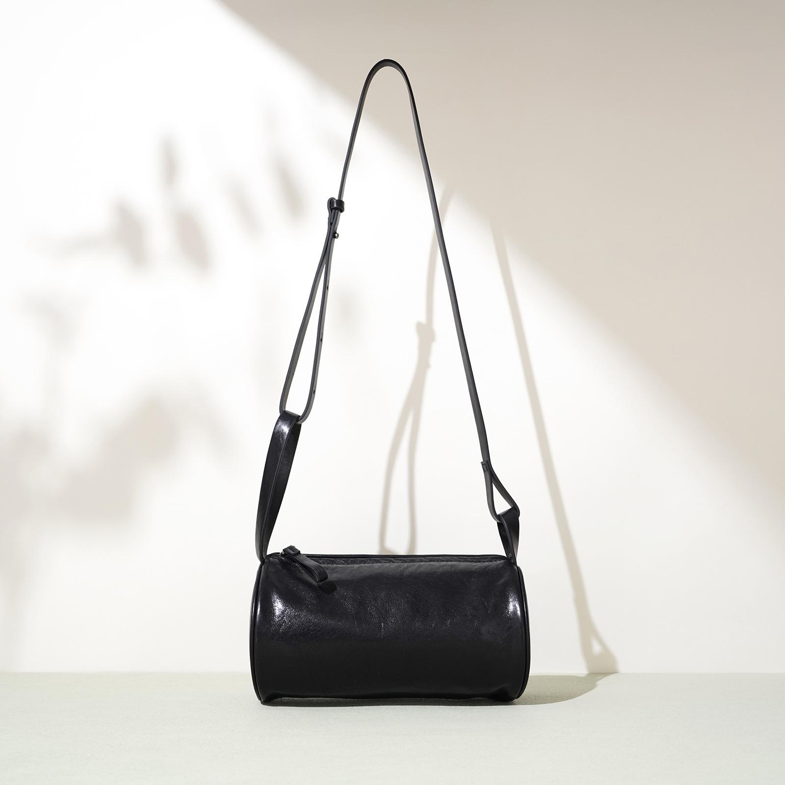 

Нишевая дизайнерская сумка через плечо высокого класса, переносная женская кожаная сумка на голову, простая, модная и универсальная чёрный