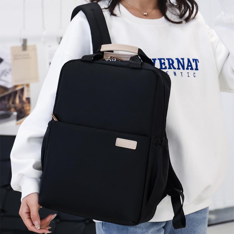 Simple backpack, fashionable shockproof computer bag, fresh high school student schoolbag, women's casual and lightweight backpack.