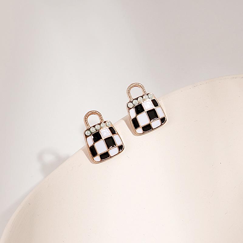 Black & White Checkered Earrings with Retro Bow and Geometric Design
