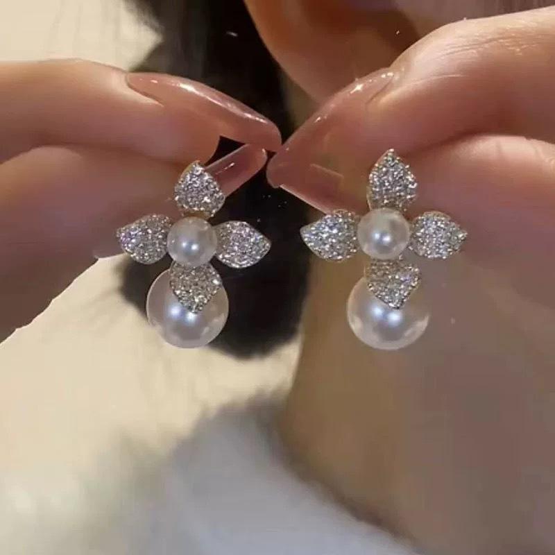 Silver needle niche design petal pearl stud earrings women, new temperament zircon flower earrings earrings 925 silver needle