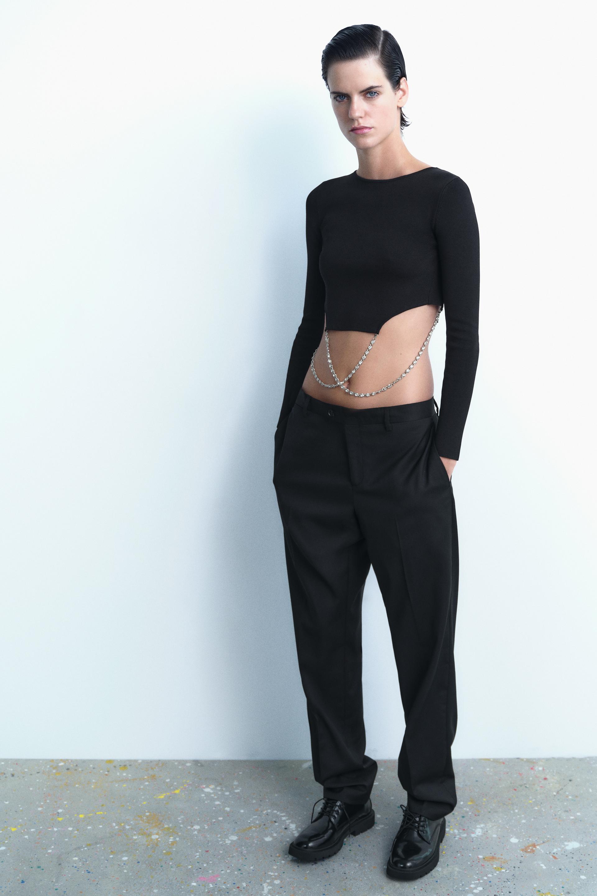 

ТРИКОТАЖНЫЙ ТОП СО СТРАЗАМИ-ЦЕПОЧКАМИ