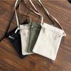 Minimalistische tragbare Handytasche Unifarbene Nylonstoff-Umhängetasche Dünner Riemen Leichte Crossbody-Tasche für Männer und Frauen