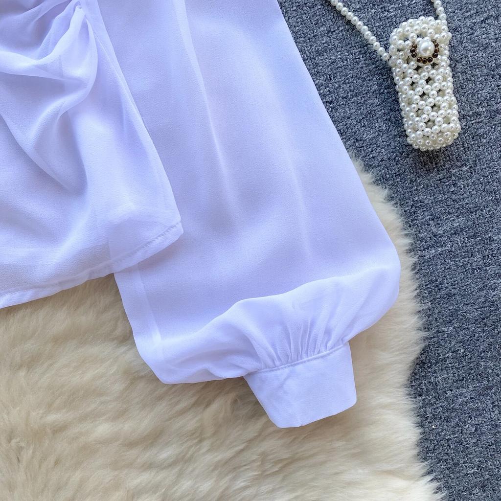 Nové jaro 2024 Elegantní tenká kancelářská halenka Ženy Šikmý límec mimo ramena Sexy topy Dámské Francie Jednobarevné módní design Šifonové topy