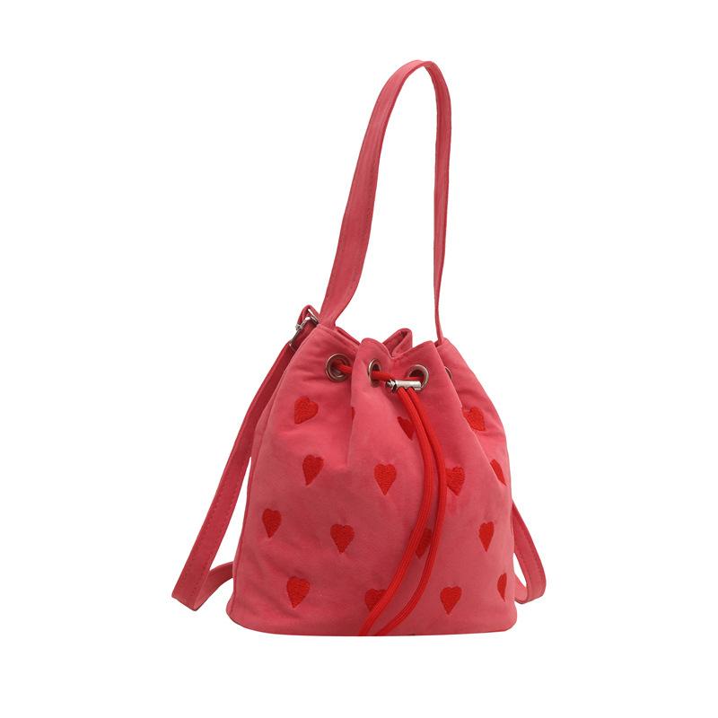Fresh bucket bag 2025 spring and summer tide fashion messenger portable vegetable basket love contrasting color bag woman