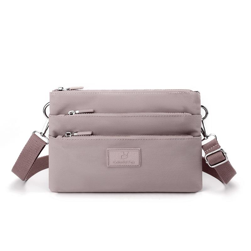 Crossbody bag women's large-capacity multi-layer shoulder bag simple versatile anti-splashing bag