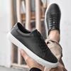 Men's White Low-Top Casual Cowhide Shoes with Thick Sole and Breathable, Versatile Round Toe Design.