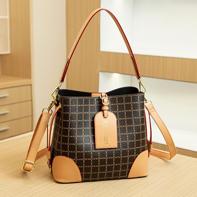 Niche luxury women's handbag, high-end bucket bag, 2026 new vintage fashion versatile crossbody bag, internet celebrity hot item
