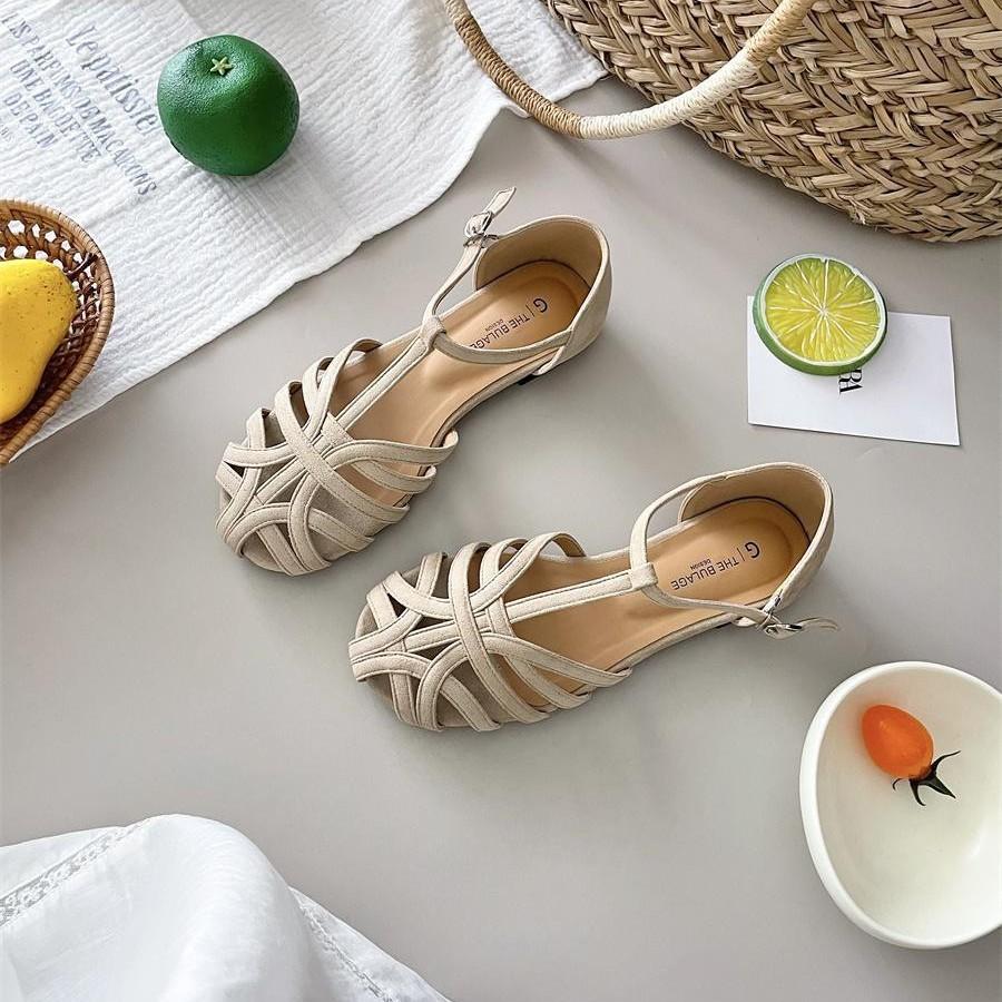 Feenwind flachbodige Schweinekäfig-Sandalen Damen 2025 Sommer neu hohl ein Riemen römisch flachbodig Tasche Kopf Sandalen Damen