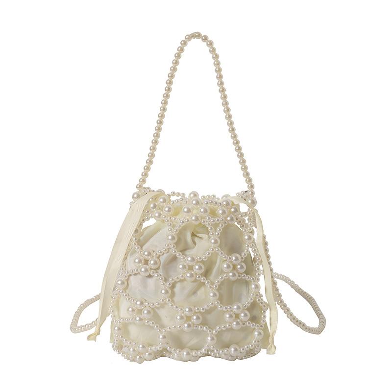 Niszowa ręcznie robiona torebka z koralikami z pereł retro wiaderko niszowa tkana torebka ażurowa torebka z koralików 2025 wiosna nowa ling