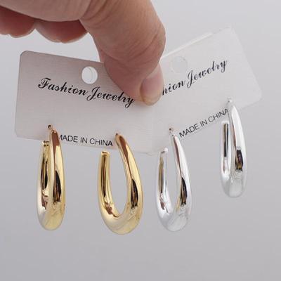 Orecchini pendenti in metallo liscio a forma di U color oro per donna, geometria cava, design ovale a goccia d'acqua, orecchini pendenti da donna