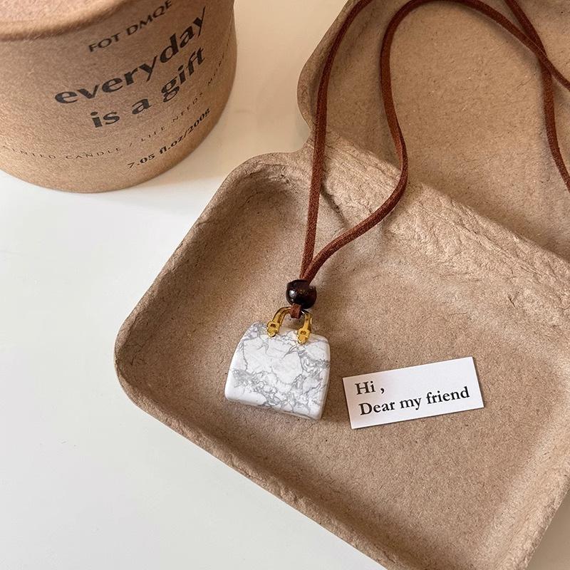 Kreative Legierung Tasche Halskette Verstellbares Braunes Lederseil Pullover Kette Luxus Pullover Halskette Schmuck Für Frauen