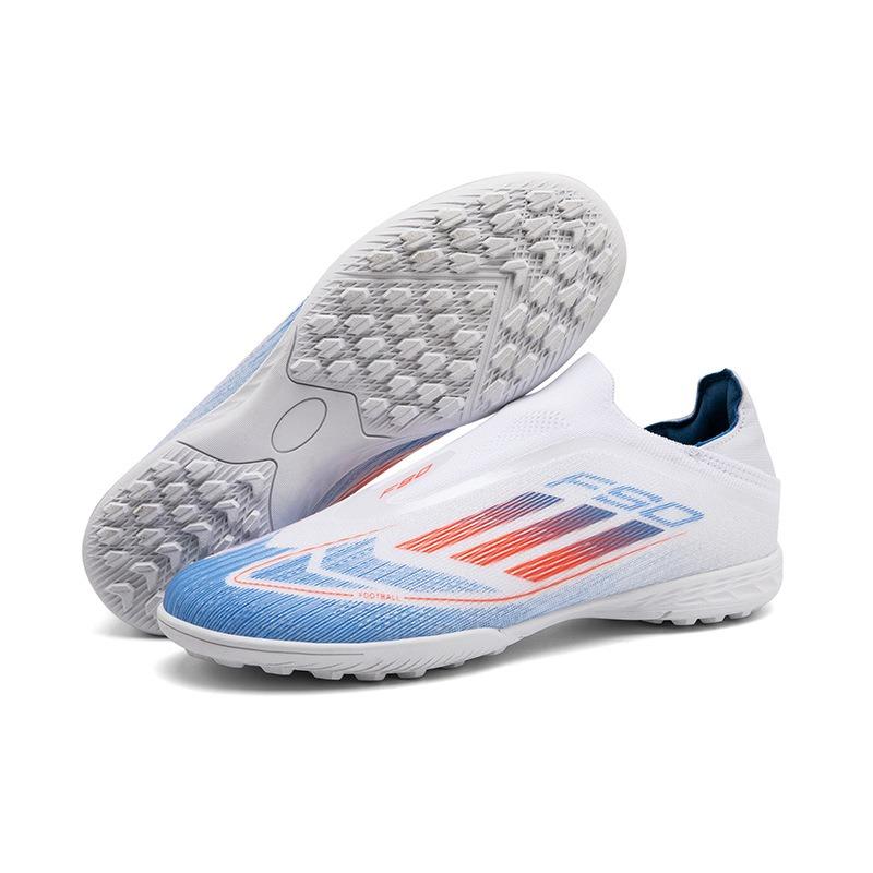 Nové kopačky na mistrovství světa Kolíky Přírodní tráva Zlomené kolíky Pánské a dámské tréninkové boty Profesionální soutěž