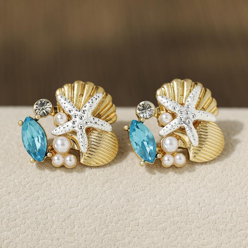 

Exquisite Crystal Starfish Shell Earrings for Women Ocean Style Blue Zircon Inlay Metal Stud Earring Gold Color Piercing Zircon золотистий