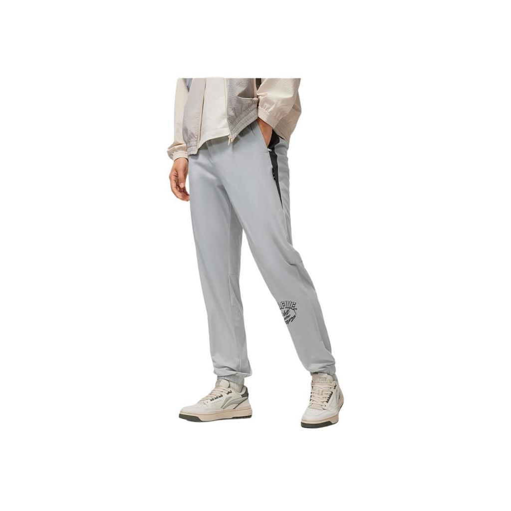 Li Ning Basketball Series Spliced Letter Mid-Rise Tapered Knit Sports Pants Men bottoms Mist-Gray AYKU389-1