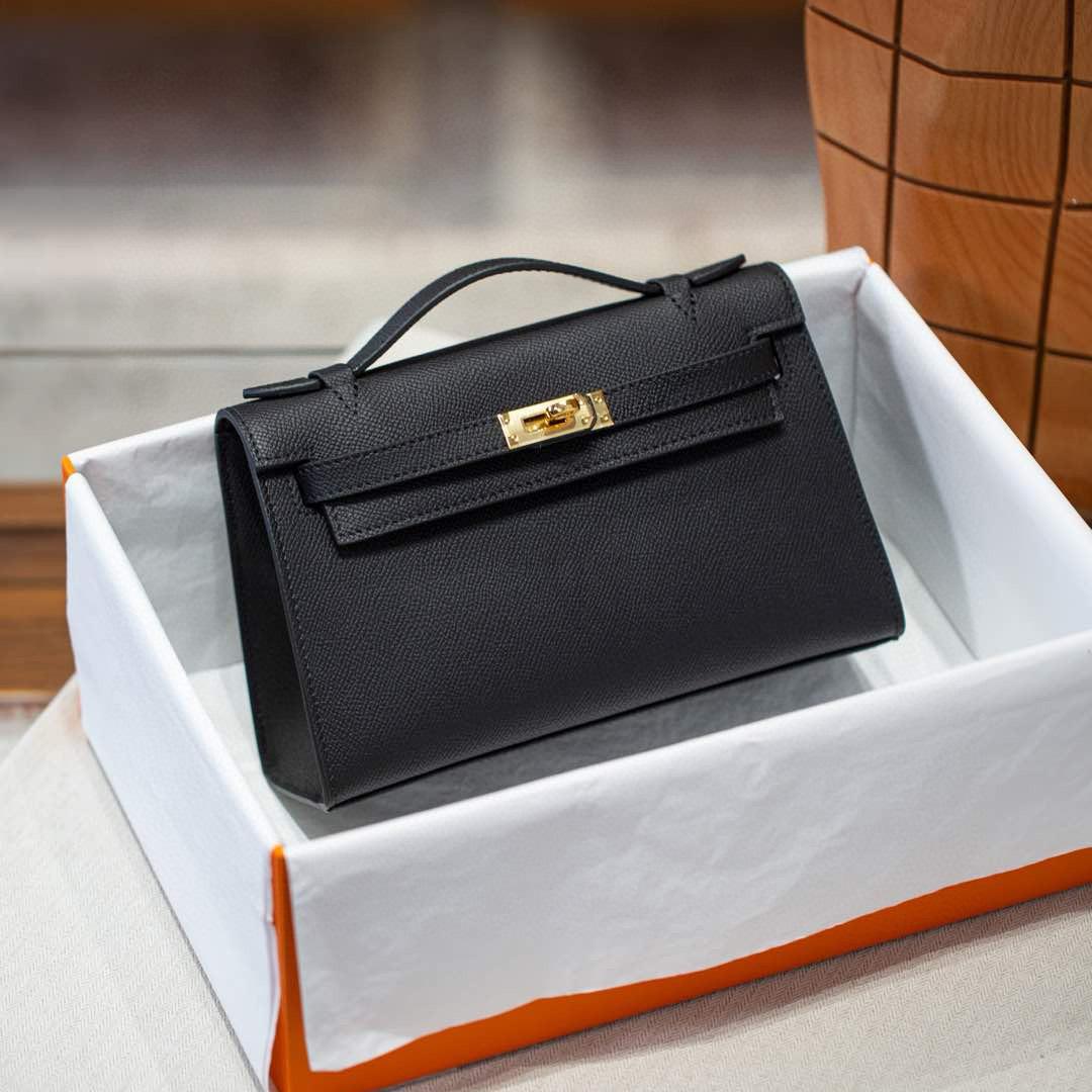 

Ремінець Натуральна шкіра Першого покоління Пільгова сумка Високоякісна Натуральна шкіра Одне відділення Маленька Міні Сумочка Клатч Сумка-браслет для жінок 22x13x7cm