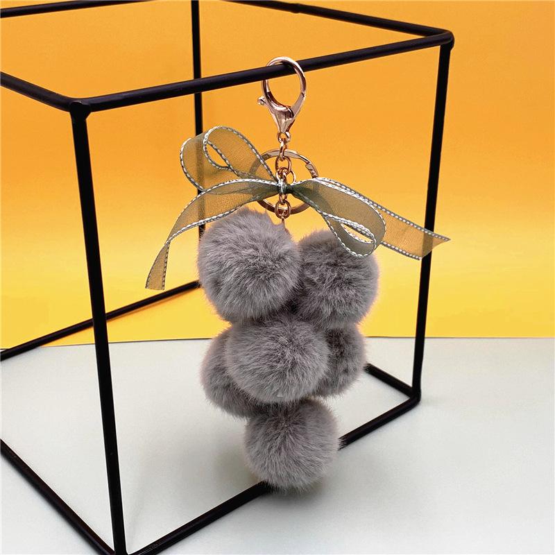 

Cute Creative Grape Fruit Lace Bow Fur Ball Plush Doll Toy Keychain Pendant Bag Hanging Backpack Charm Car Keyring Year Gift