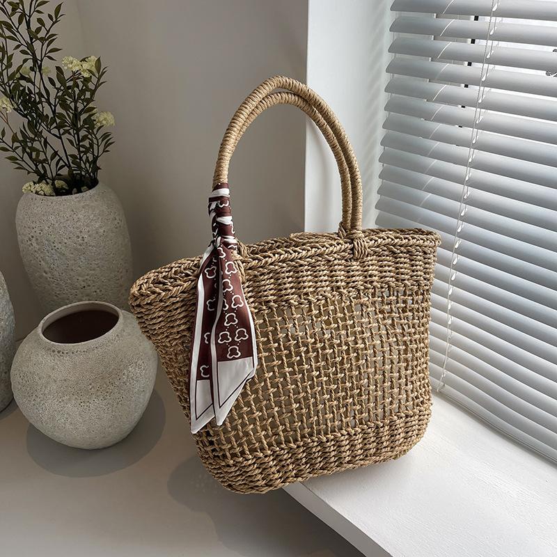 

Летняя новая нишевая плетеная сумка с полым узором для отдыха на море, женская сумка-тоут большой вместимости, универсальная сумка хаки