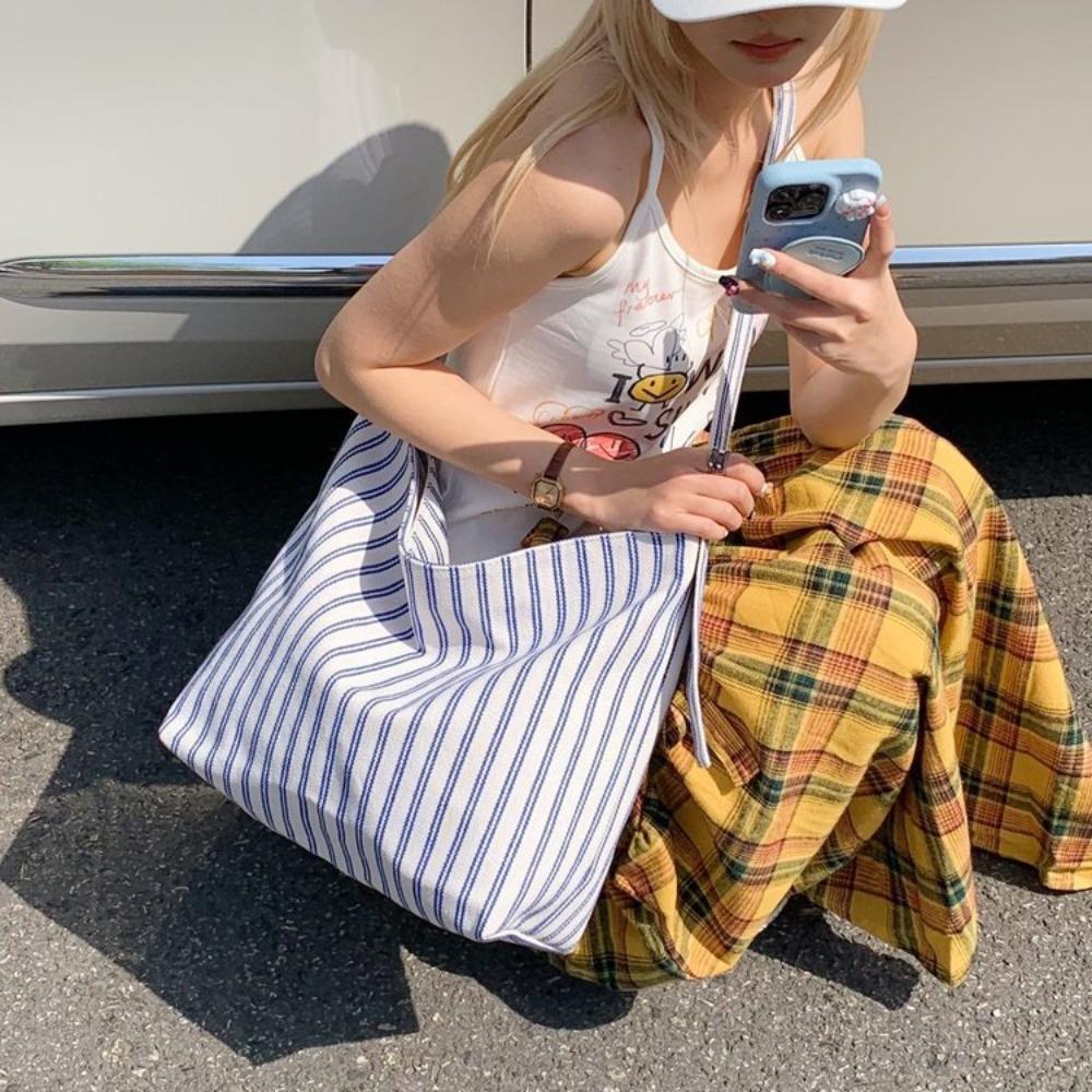 Cross-border new Japanese and Korean style contrasting striped large-capacity tote bag design versatile youth one-shoulder armpit bag women's bag