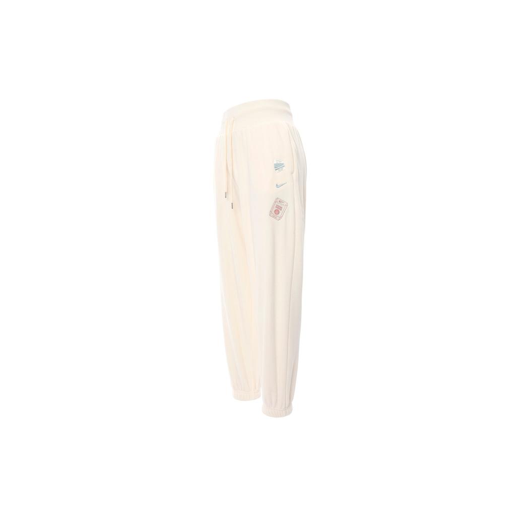 Nike Pantaloni da tuta casual affusolati a maglia a vita alta con coulisse e logo ricamato da donna Avorio chiaro FD5502-110