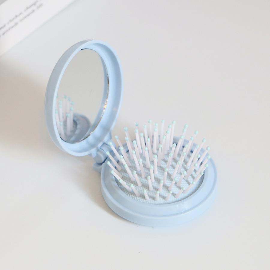Kompakter Klappkamm & Schminkspiegel mit Airbag-Polster für Kopfmassage