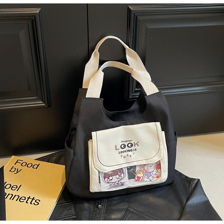 

Canvas bag women s large capacity 2024 new autumn and winter leisure shoulder shopping bag pain bag commuter tote bag чорний