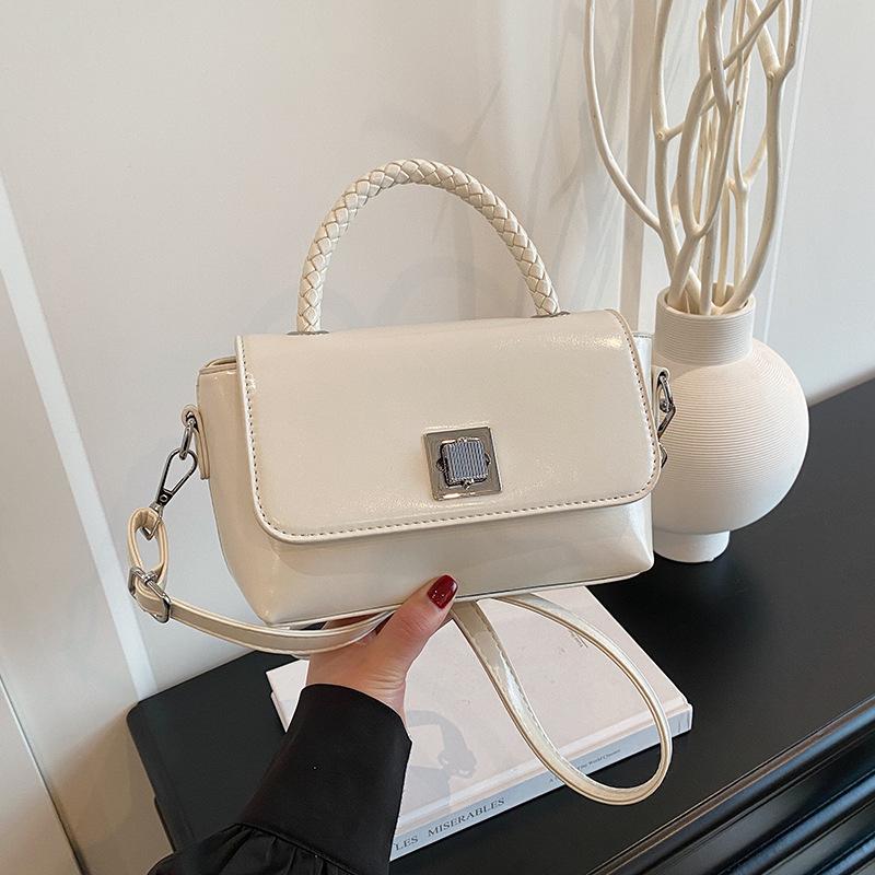 New fashion niche design popular lock clamshell bag portable shoulder messenger women's bag