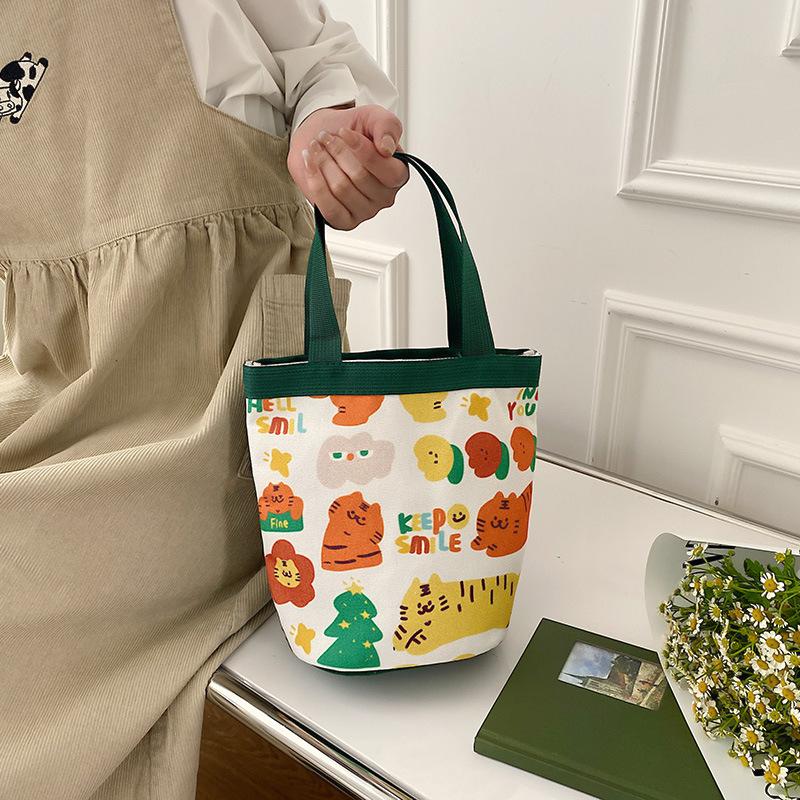 Cute little tiger illustration bucket bag 2025 new little fresh girl handbag simple bento bag woman