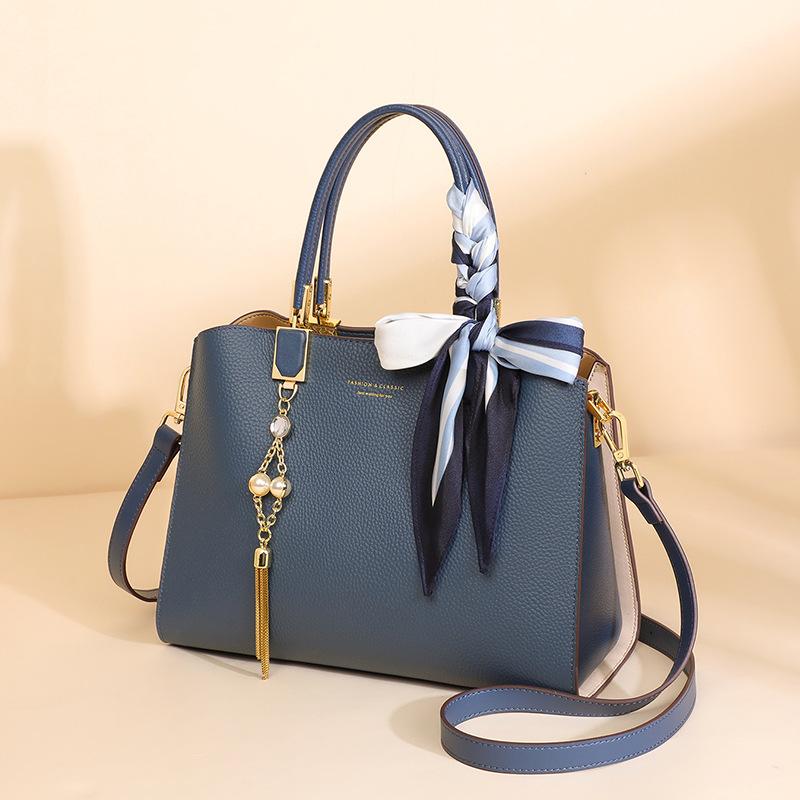 

Новая сумка Женская сумка через плечо Весна и лето Высокий класс Натуральная кожа Сумка на плечо для мамы