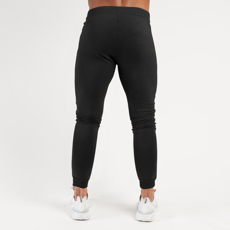 Frühling und Sommer Neue einfarbige Fitnesshose Lässige elastische Sporthose Herrenmode