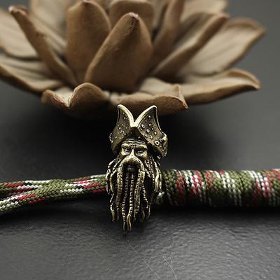 Portachiavi con perline di coltello per polpo in rame, ciondolo in corda, teschio in ottone, con perline di paracord