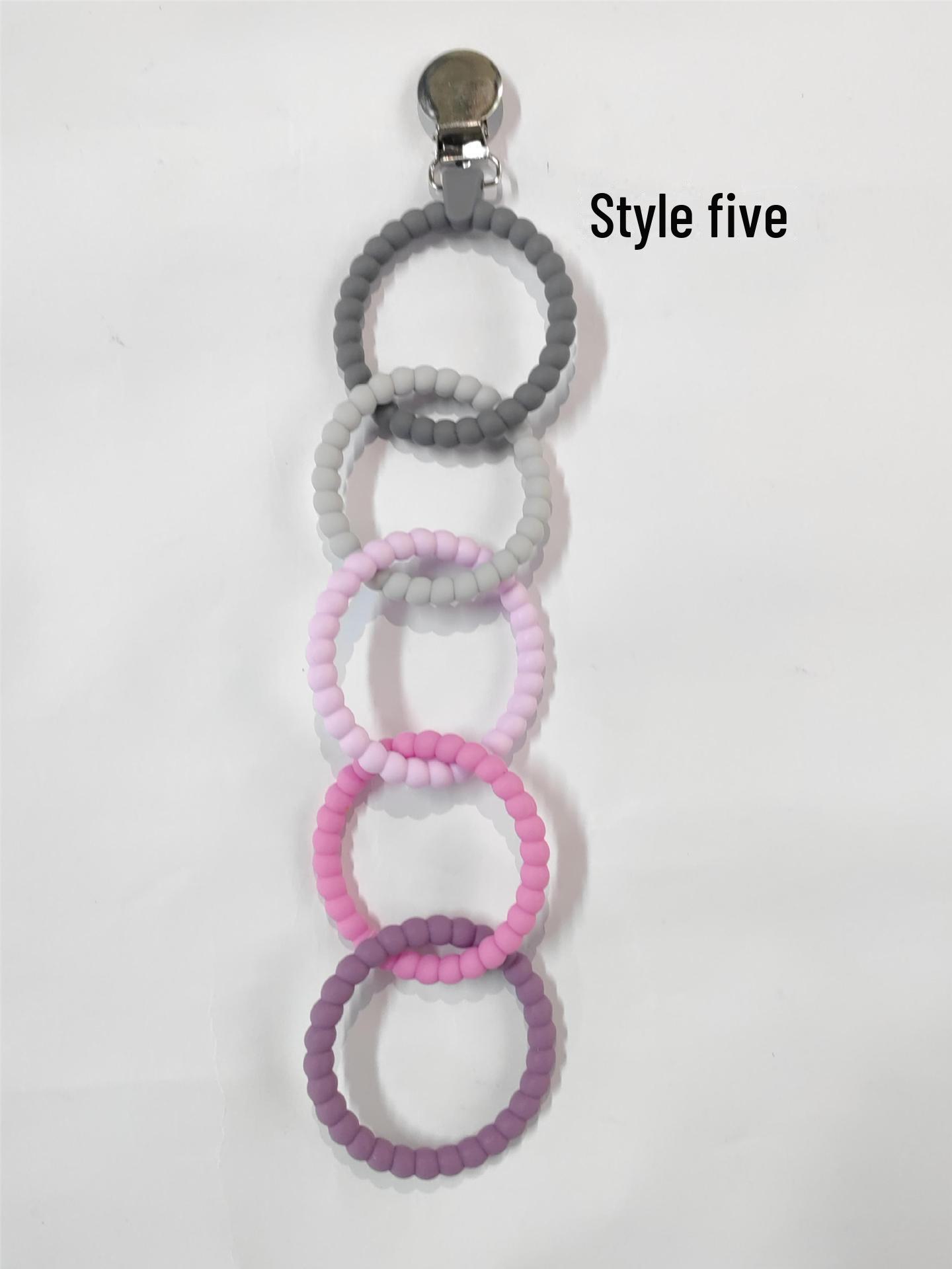 

Новая эластичная игрушка-прорезыватель для зубов для малышей с пятью кольцами 36g