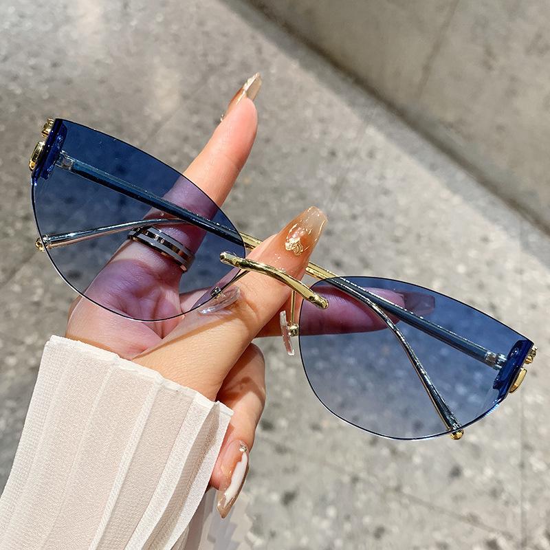 Ocean Piece Sunglasses Frameless Curved Sunglasses Female Leopard Head Glasses