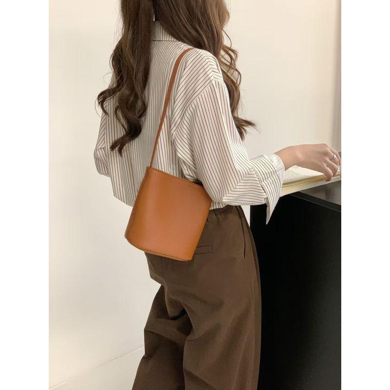 

Минималистичная маленькая сумка-ведро Сумка из натуральной кожи для женщин 2025 Новое поступление Кожа первого слоя На плечо Подмышку Кроссбоди Женская сумка Модная Brown