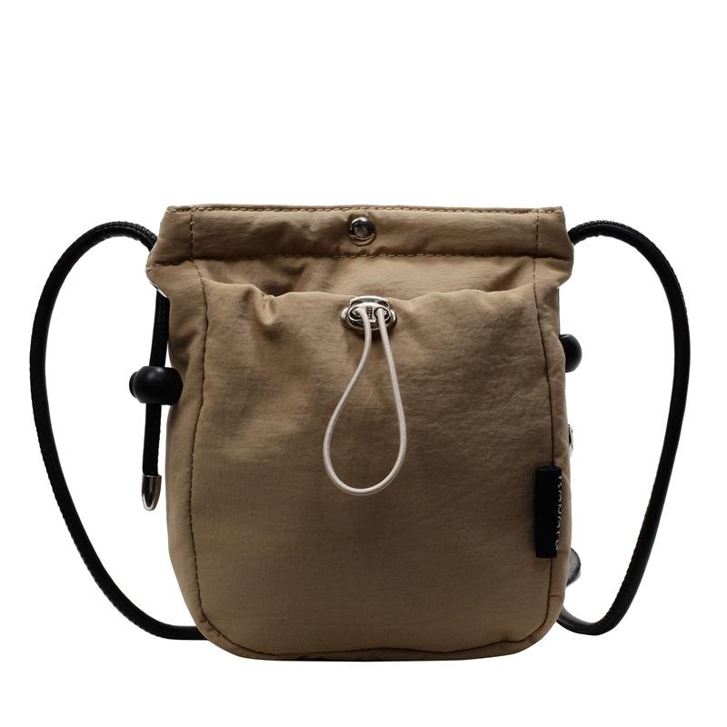 

2025 spring new mobile phone messenger bag fashion trend women s messenger bag light drawstring canvas small bag