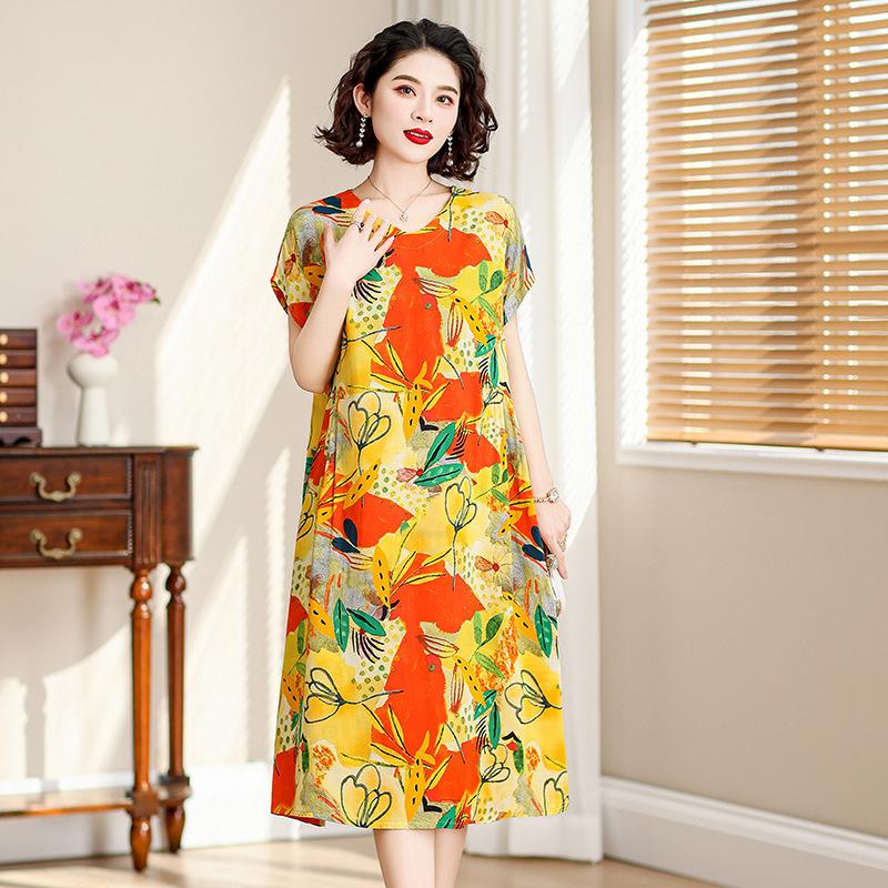 Nouvelle robe en coton et soie mode d'été pour femmes ample grande taille florale coton artificiel coton tempérament jupe moyenne et longue