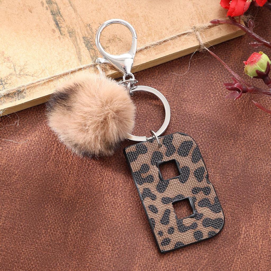 Western Cowboy Leopard Print Leather Keychain with Acrylic Letter and Plush Ball Accessories