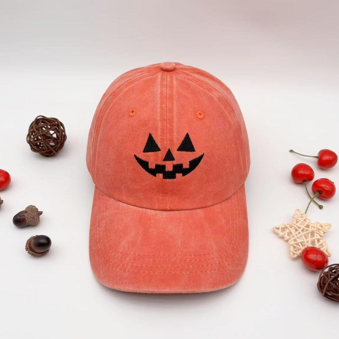 

Washed cotton unisex casual baseball cap with embroidered Halloween pumpkin smiley face