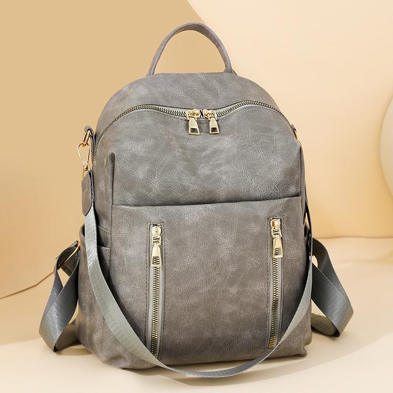 Simple Backpack Women's New Trend Fashion Pu Soft Leather Backpack Large Capacity Commuter Travel Bag